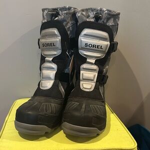 Waterproof boots, never used, size 14 men’s.